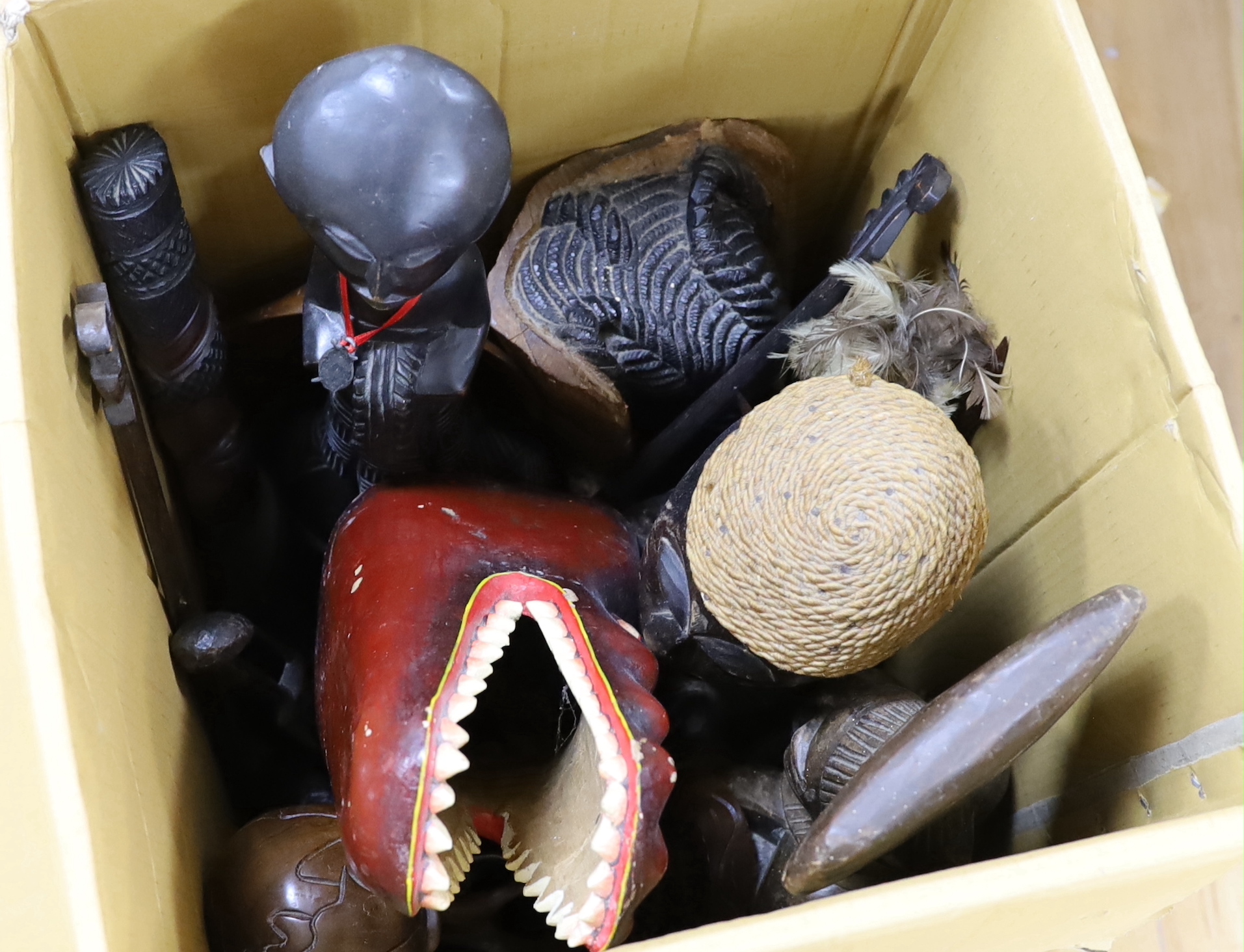 A large collection of various African carvings, masks etc